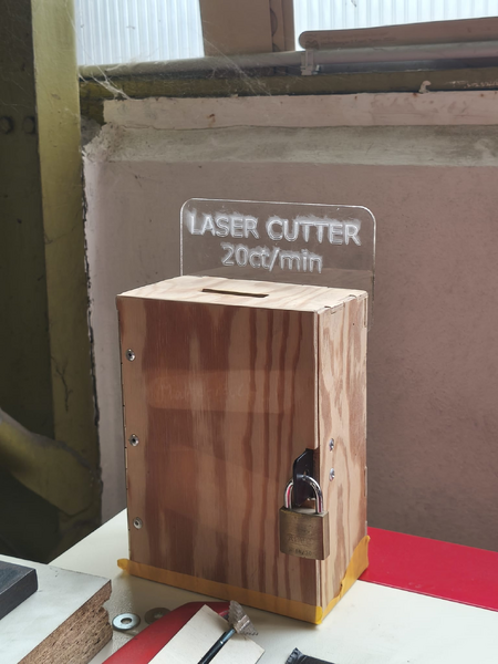 File:Laser Cutter tax sign.png