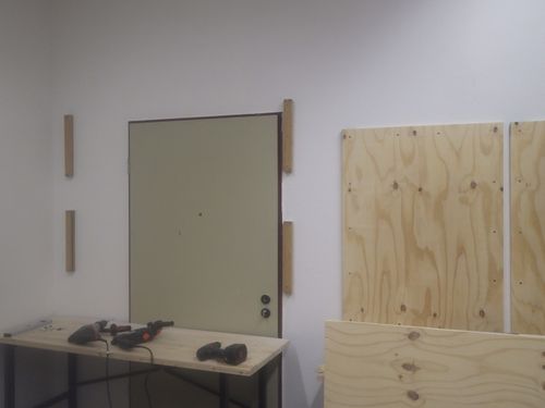 large leftover pieces of wood on the walls create easy mounting options