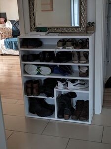 Finished and in use shoe rack/ entryway table