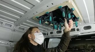 We glued the wood frame to the ceiling of the van / 2