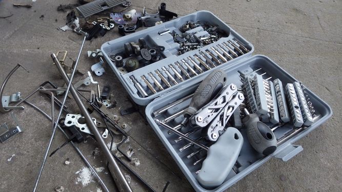 tools used in the teardown and some of the parts and materials that could be salvaged besides the bell
