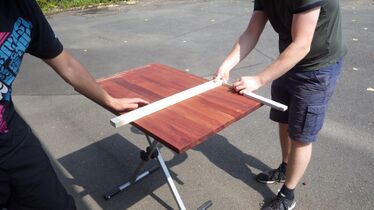 preparing to cut a practice piece from one of our stock boards