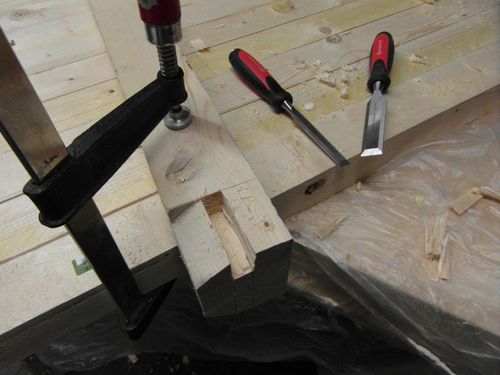 chiseling a piece out of a leg joint